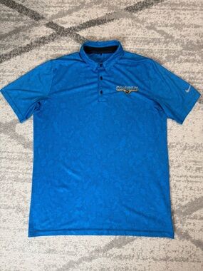 Nike dri fit golf polo blue size medium. Company logo on chest